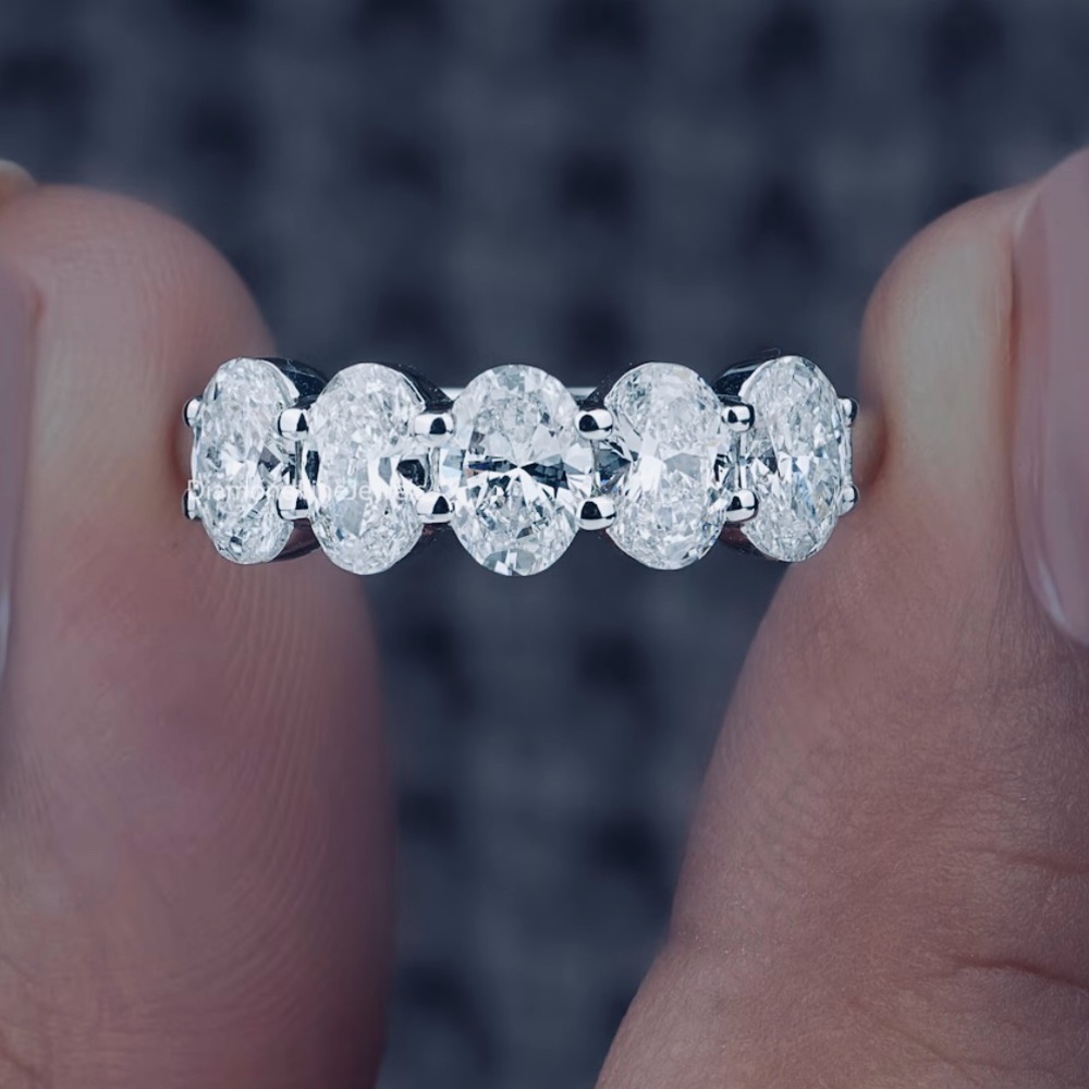 High end moissanite oval eternity band .40 each
